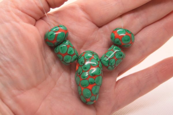 Bright Green Dots on Orange Base on a 24" chain