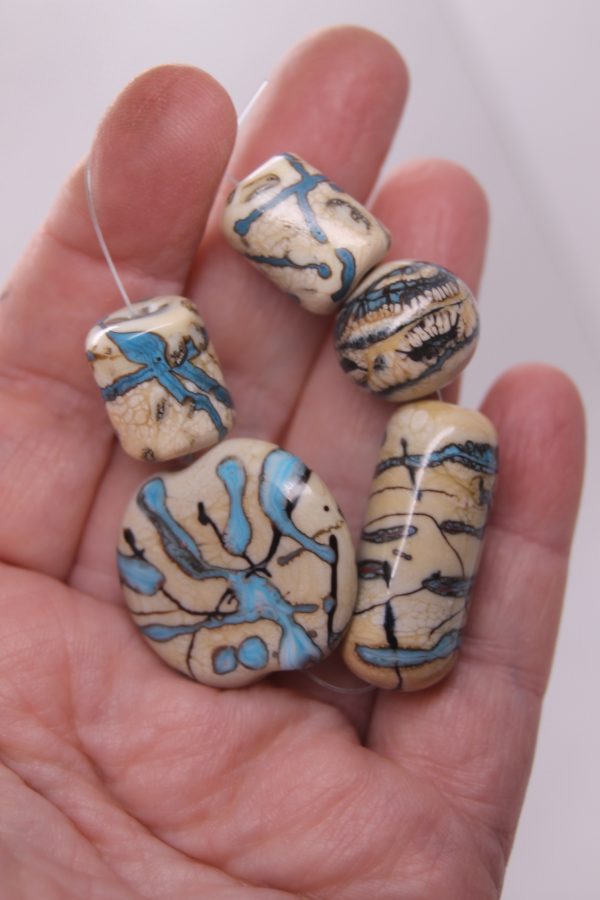Turquoise on Dark Ivory with Black Highlights