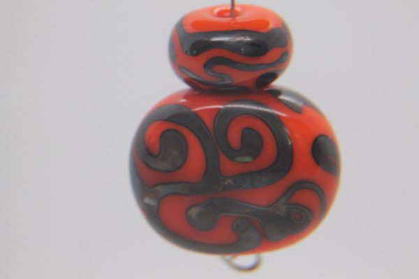 Metallic Black on Reddish-Orange Base - Image 2