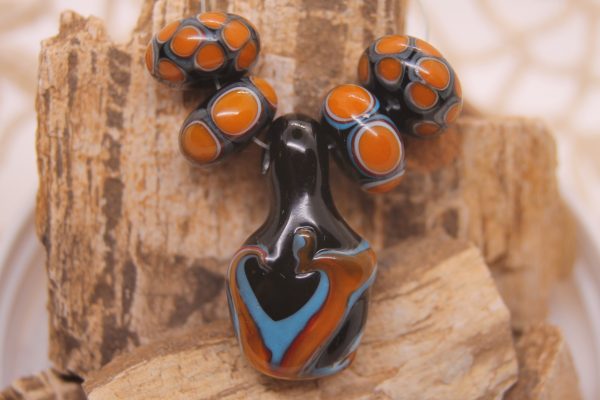 Black Base Focal with Orange and Turquoise Heart on a 24" cord