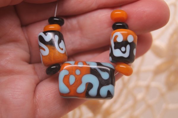 Black and Apricot Half-n-half with Sky Blue on a 24" cord - Image 5