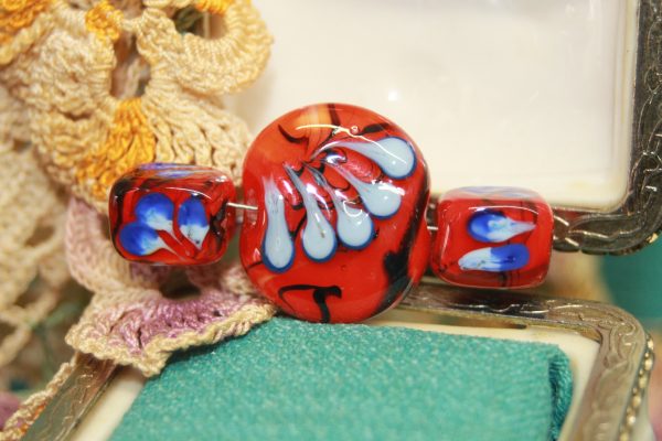 A Trio of Transparent Red with Sky Blue on a 24" braided cord - Image 3