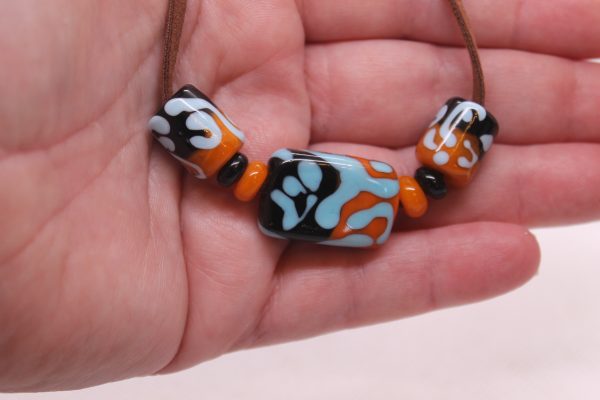 Black and Apricot Half-n-half with Sky Blue on a 24" cord - Image 8
