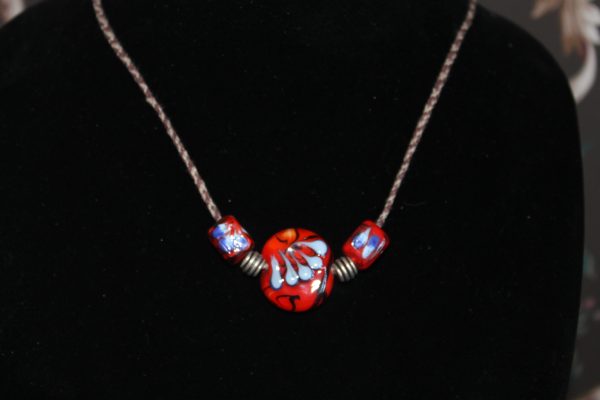 A Trio of Transparent Red with Sky Blue on a 24" braided cord