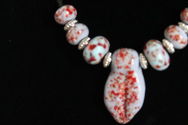 Periwinkle with Red Specks on a 24" chain with matching earrings