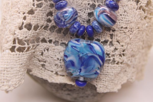 Blue, Blue and Blue on a 24" cord with matching earrings